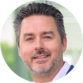 Headshot of James Lumbra.